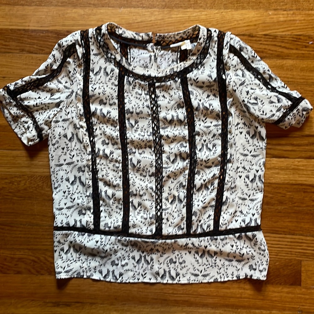 Anthropologie Top- bird with crocheted black fabric